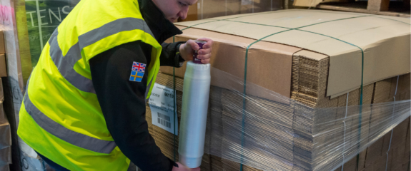 Is a pallet wrapper quicker than wrapping by hand?